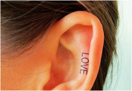 Top 10 des conceptions de tatouage de l'oreille Photo