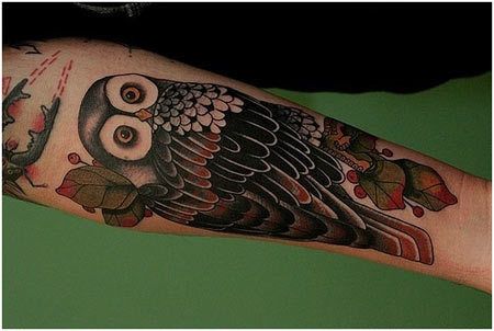 avant-bras hibou tatouage