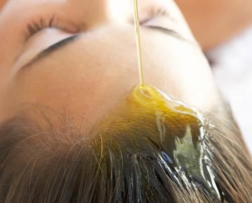 avantages de cheveux de traitement de l'huile chaude