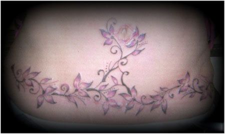 tatouages ​​de fleurs d'estomac