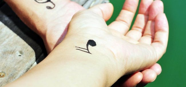 Top 15 des conceptions de tatouage musicales Photo